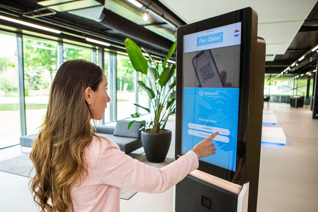 Women experiencing service at a kiosk